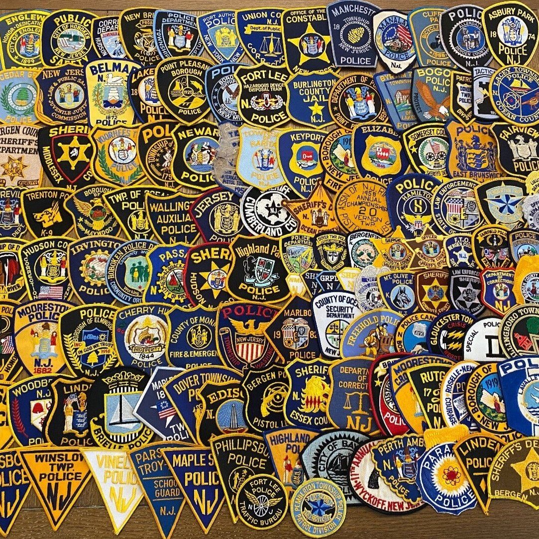 Collage of hundreds of New Jersey police, sheriff, and corrections department patches